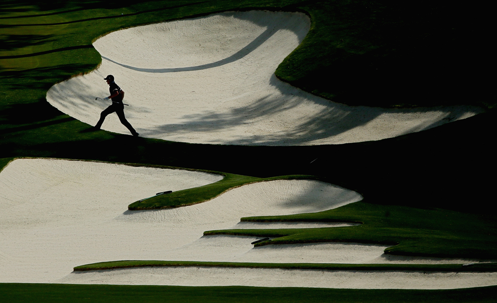 Jimmy Walker of the United States walks out of the bunker on the 10th hole during the second round of the 2014 Masters Tournament at Augusta National Golf Club on April 11. (Andrew Redington/Getty Images) #