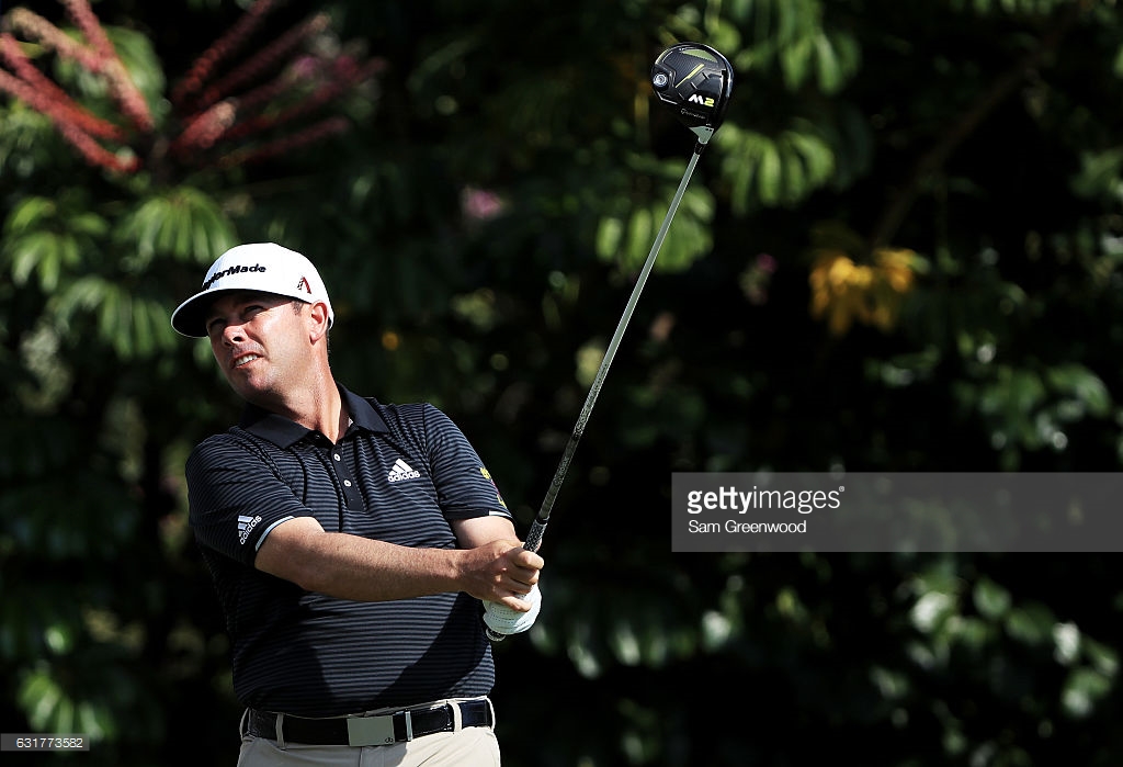 Chez Reavie of the United States plays his shot from the fifth tee during the final round of the Sony Open In Hawaii at Waialae Country Club on January 15, 2017 in Honolulu, Hawaii.
